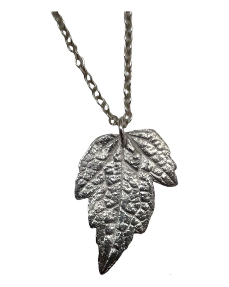 Handmade fine silver pendant made from a real leaf