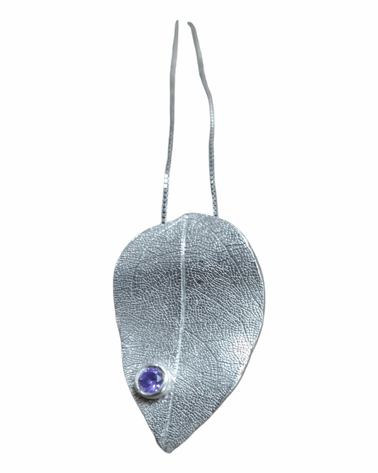 Handmade silver pendant with skeleten leaf detail set with cubic zirconia 