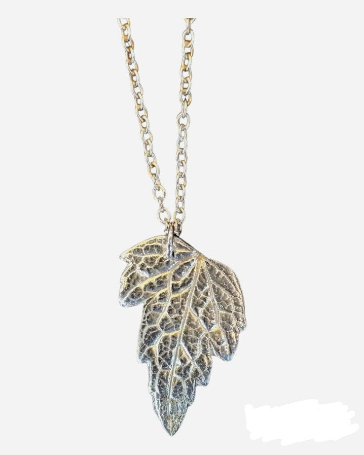 Fine silver pendant made from a real leaf